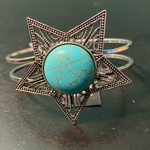 Star shaped turquoise inspired cuff bracelet.